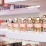 Bottles of perfume for sale on shelves